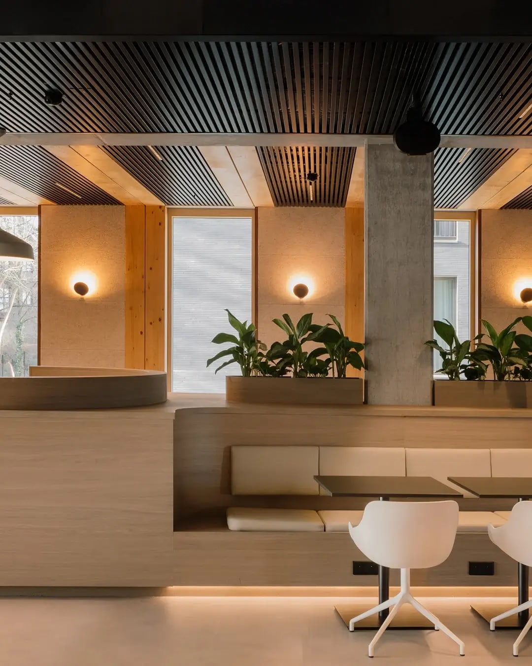 Workspace featuring RealGrain Antwerp smoky grey timber-look surface.